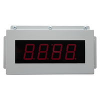 Digital display with red LED digits on a white background