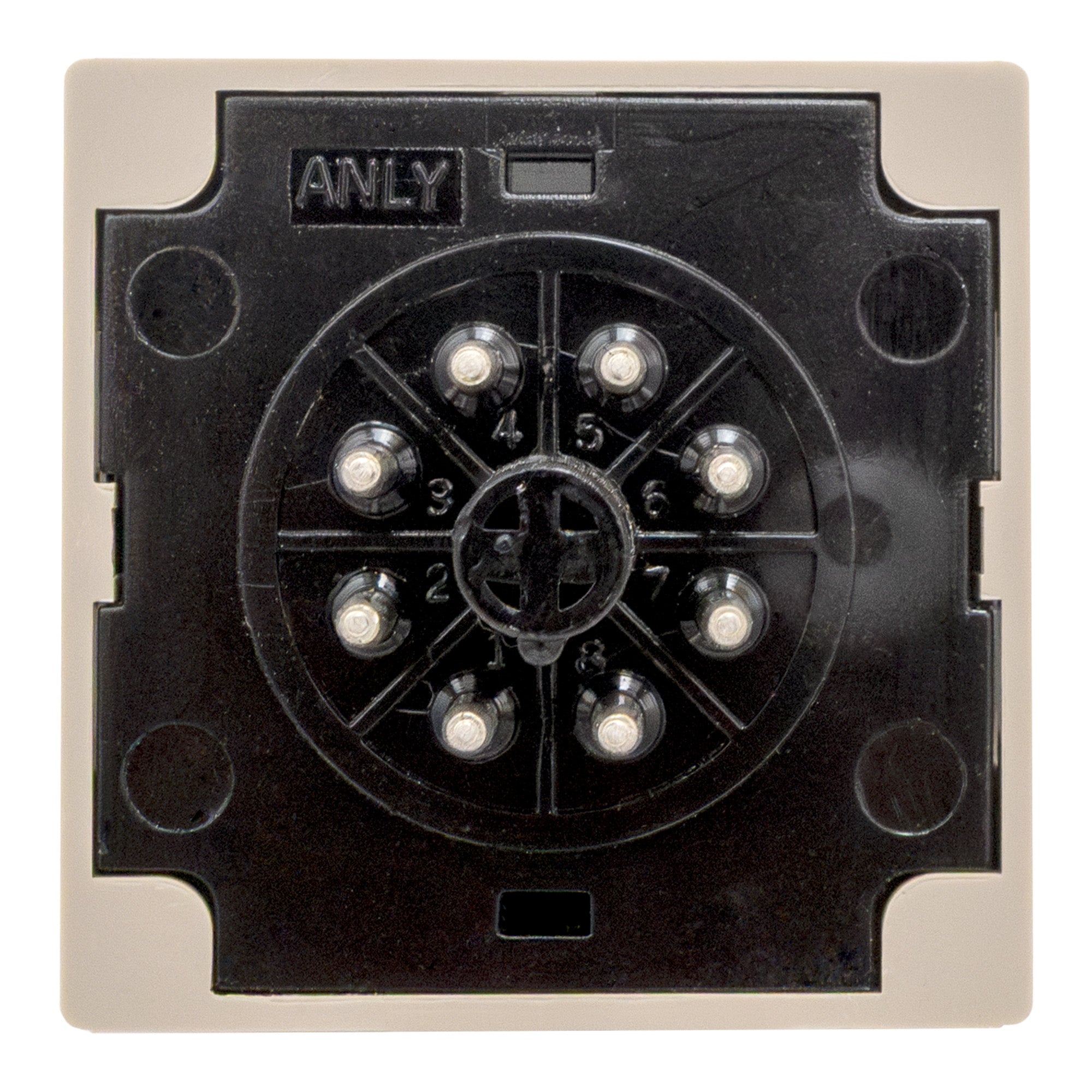 Rear of tan timer with black face and 8 metal pins on a white background.